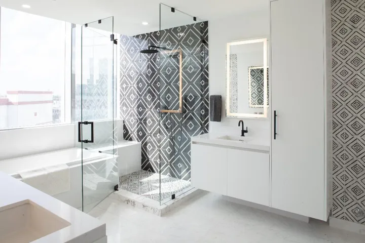 Spa-style primary bath with contemporary designer finishes.