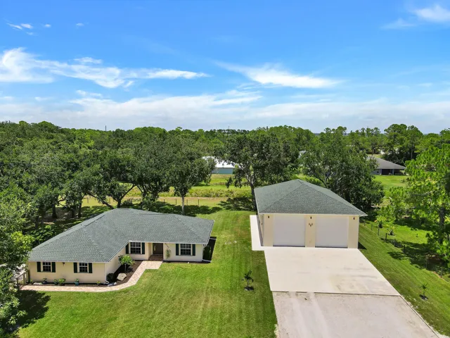 View of Home And Garage