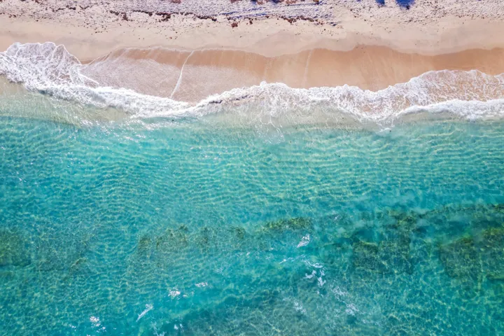 Aerial view of shoreline and ocean