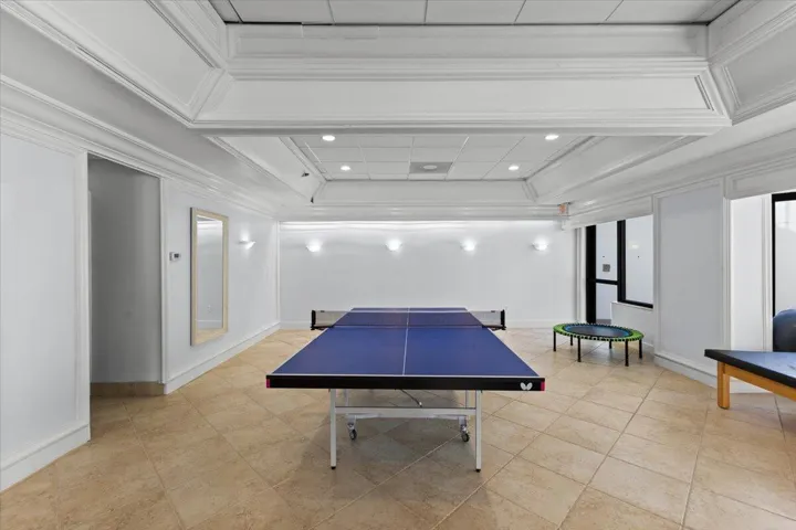 Game room with ping pong table