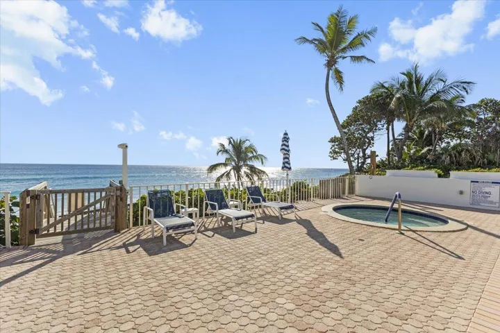 Pool deck with direct beach access