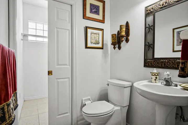 Powder room w/ 2 pocket doors.