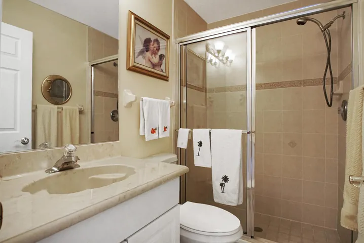 Walk in shower. Single sink, with lots of room.