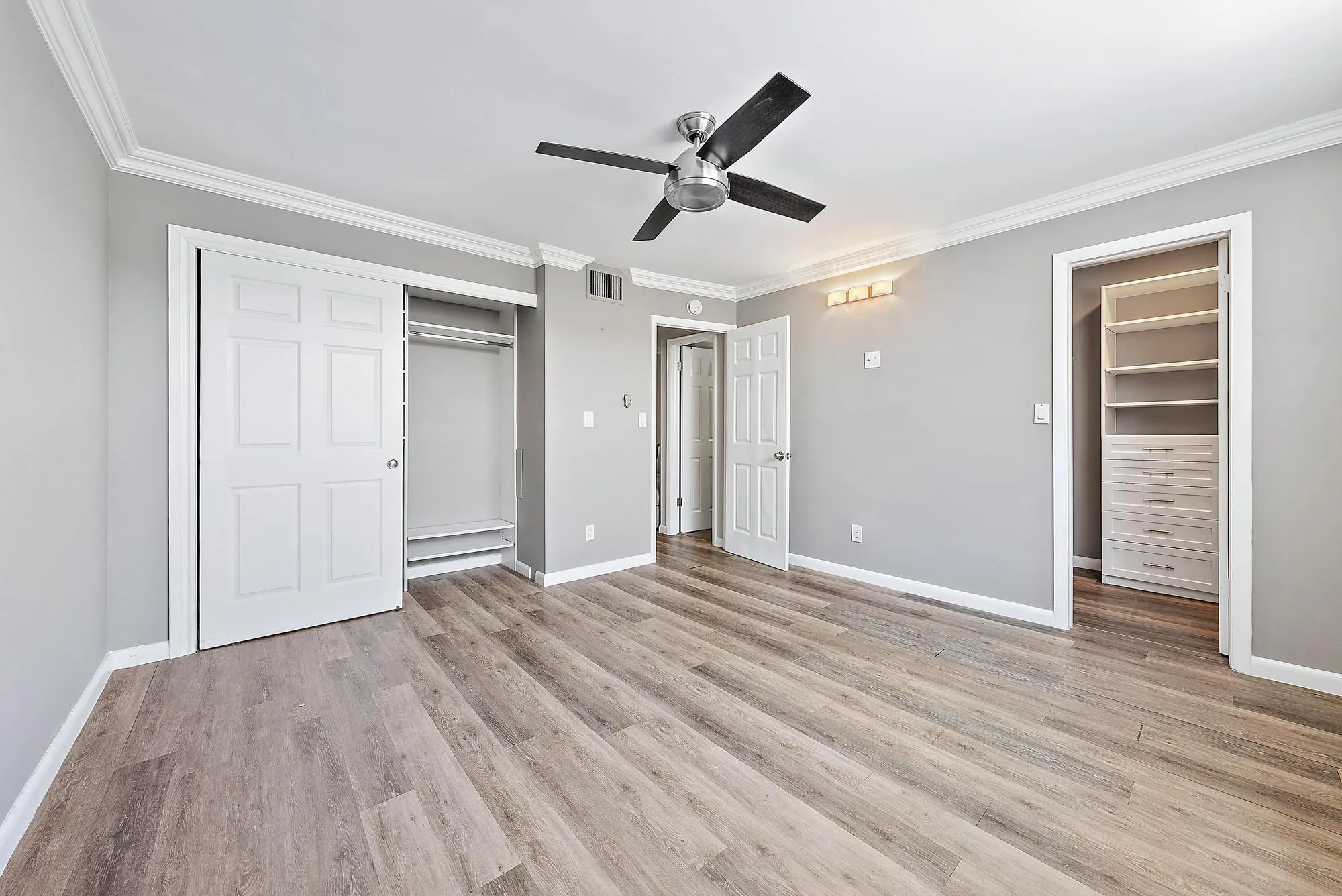 Primary bedroom with 2 closets.