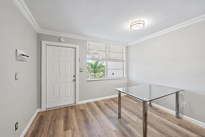 Dining area with front door.