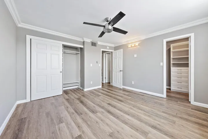 Primary bedroom with 2 closets.