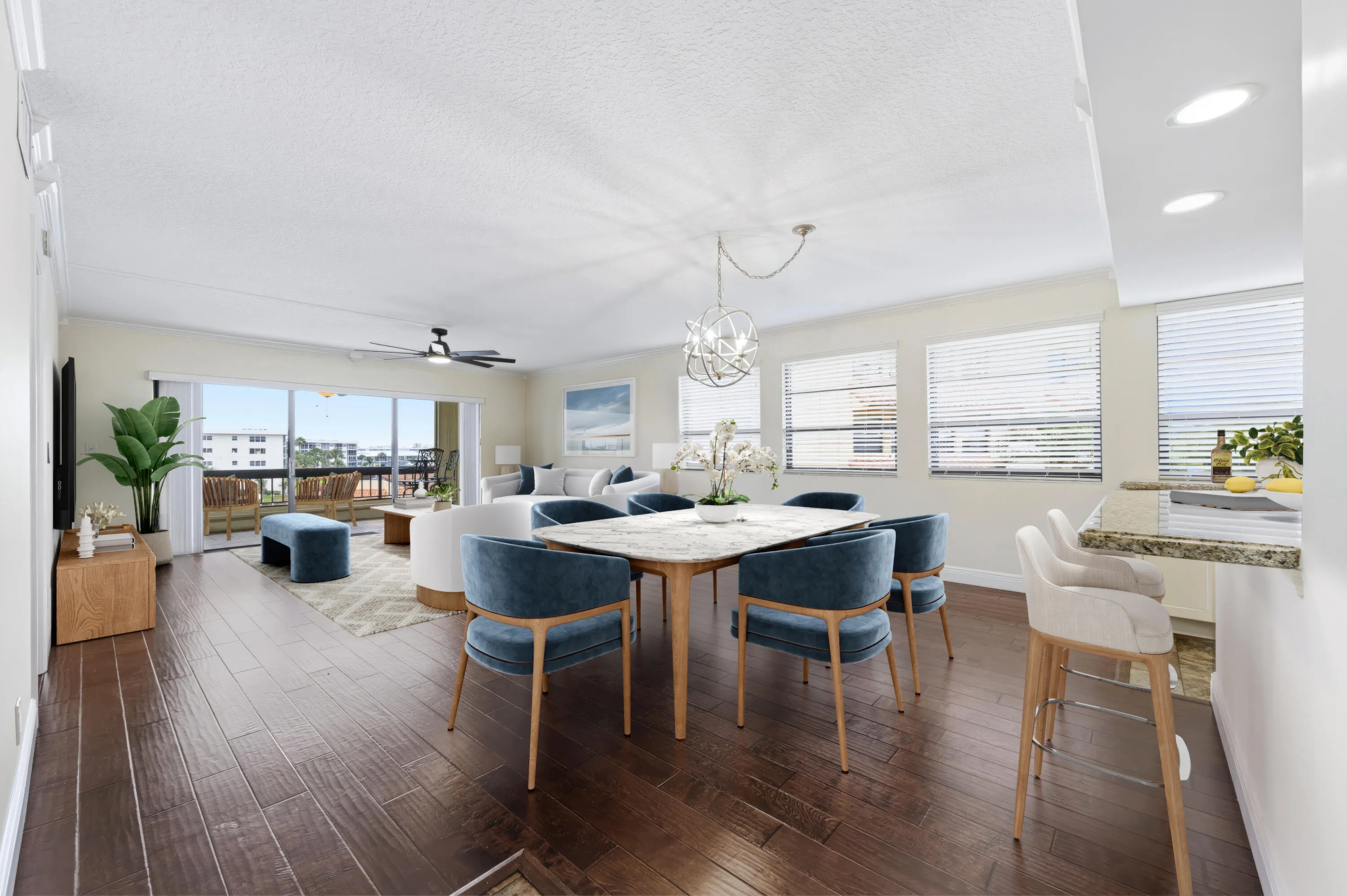 Virtually staged dining area & living room