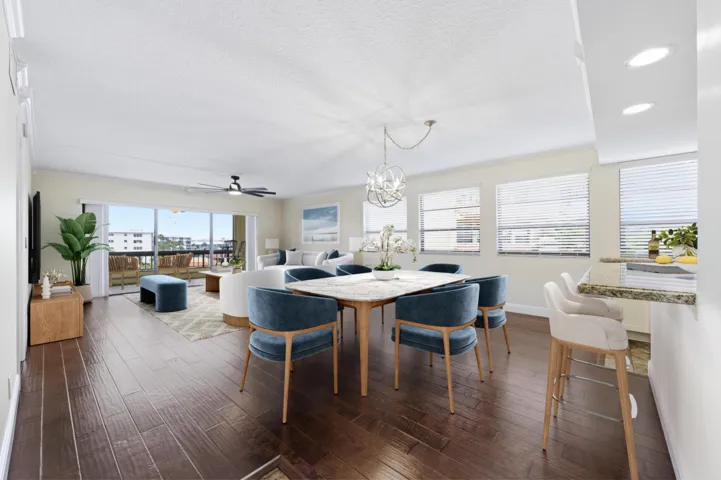 Virtually staged dining area & living room
