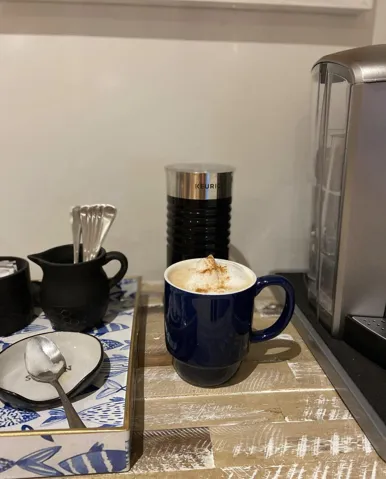 The owner has stocked the coffee bar, pour a cup and grab a book, the watch the sunrise from your balcony