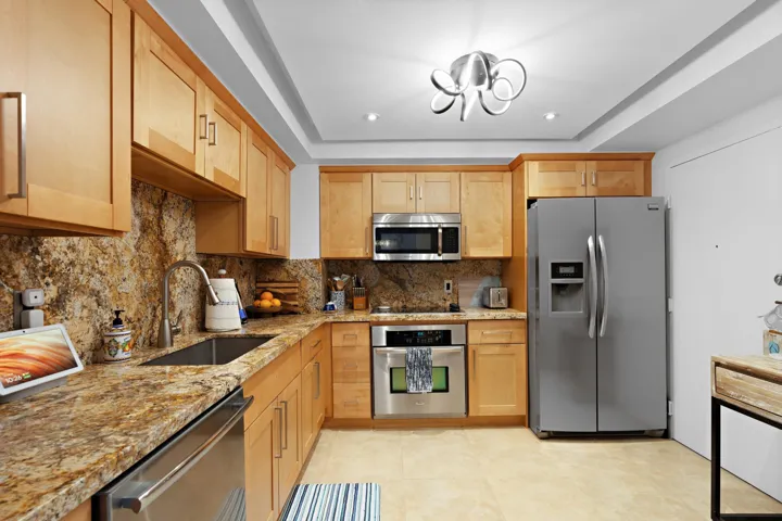 Granite countertops, Stainless Steel Appliance packae, custom lighting and everything you need to prepare a gourmet meal or a cup of coffee...