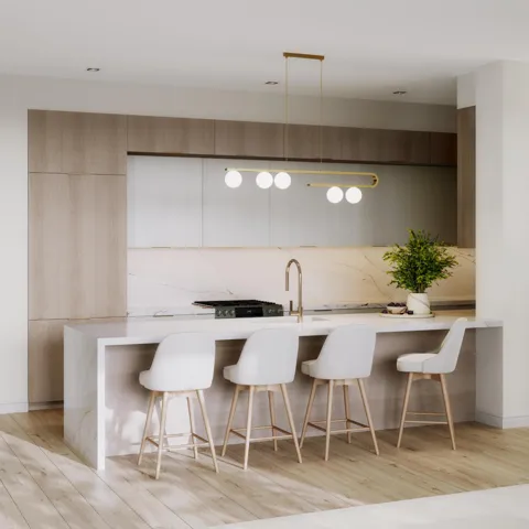 DEFINING OPPULENCE WITH BEAUTIFUL FLAT PANNELED CABINETRY, ELONGATED DINING ISLAND WITH 3 INCH CALCUTTA WATERFALL FINISH & BACKSPLASH, CUSTOM LIGHTING AND BRUSHED BRONZE HARDWARE & FIXTURES