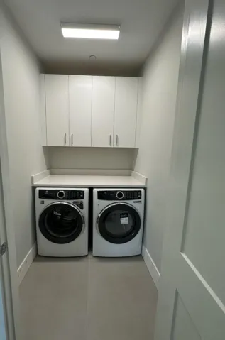 2nd Laundry Room Upstairs with 42" Upper Cabinets and Quartz Countertop!