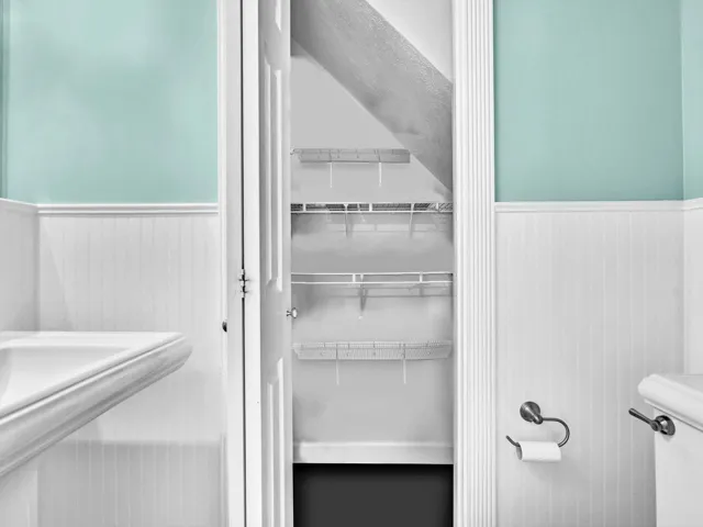 Large linen closet in half bath