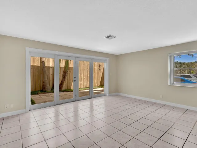 Impact doors and windows. End unit with lots of bright sunshine.