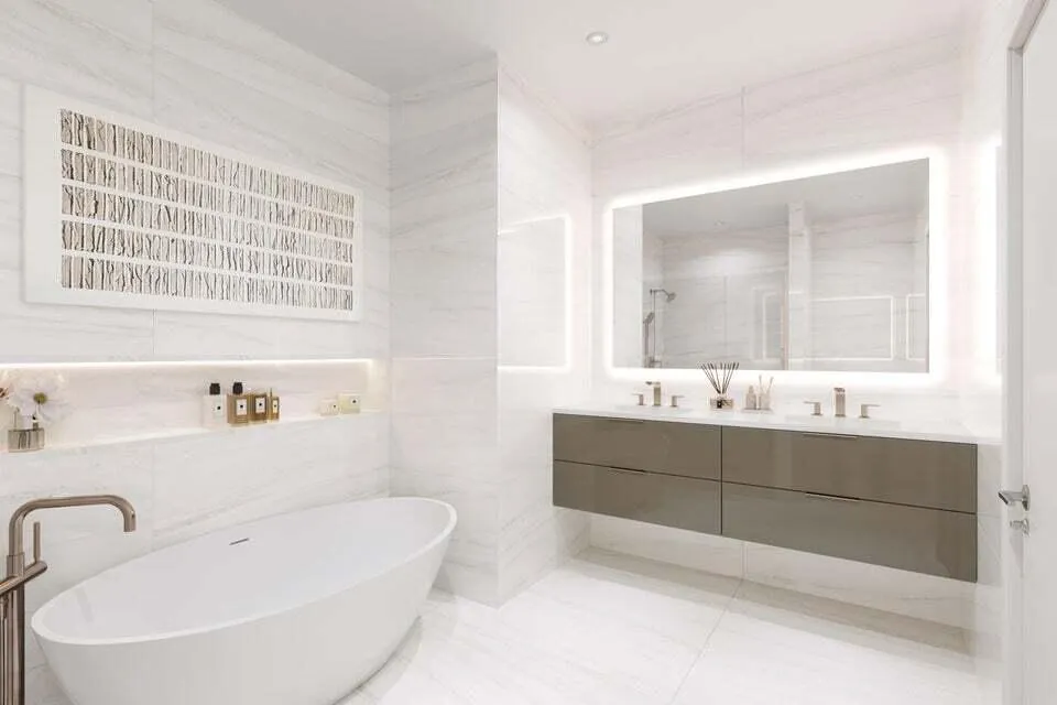 PRIMARY SUITE WITH FLOOR TO CEILING QUARTS & LUXURIOUS BRUSH BRONZE FIXTURES, CHOICE OF HIGH GLOSS FLOATING VANITY & COMPLETE WITH A SOAKING TUB AND GLASS ENCLOSED SHOWER