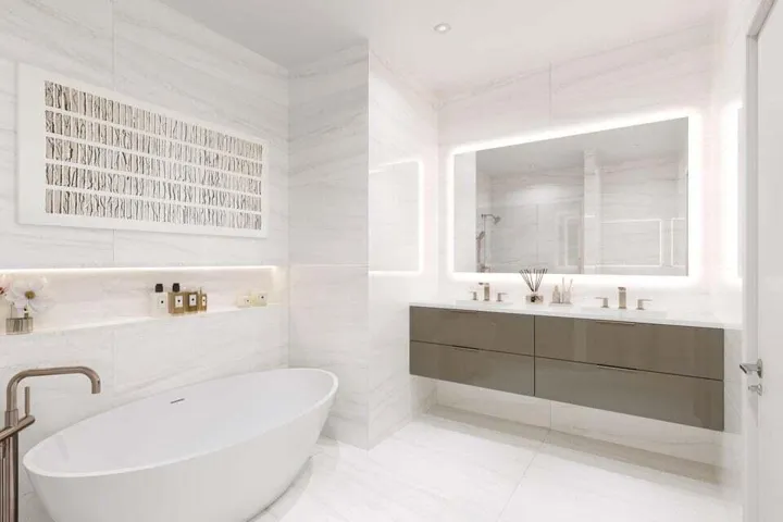 PRIMARY SUITE WITH FLOOR TO CEILING QUARTS & LUXURIOUS BRUSH BRONZE FIXTURES, CHOICE OF HIGH GLOSS FLOATING VANITY & COMPLETE WITH A SOAKING TUB AND GLASS ENCLOSED SHOWER