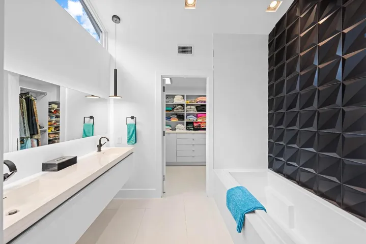 teal bathroom and closet