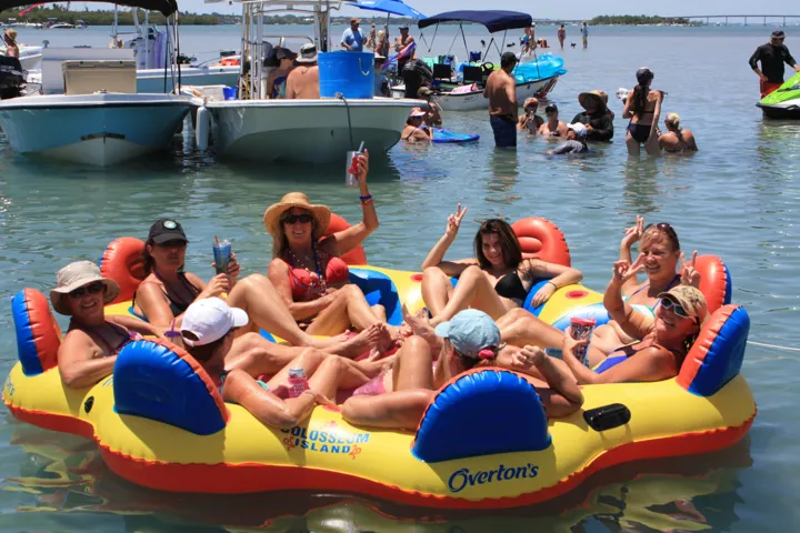 Sunset cruises and sandbar picnics—just another day here.