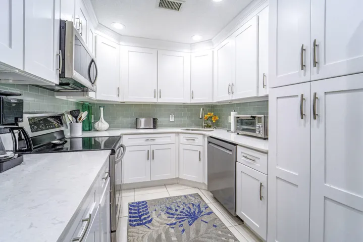 Quartz countertops shine in this chef-inspired kitchen.