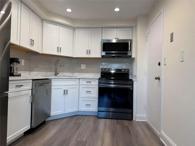 All new wood cabinets