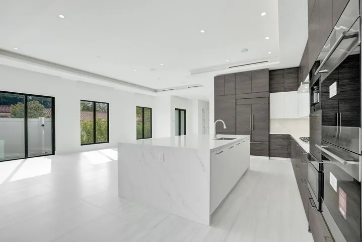 Entertaining Flow is Natural, as the kitchen is aligned with the dining and living areas for seamless first-floor entertaining.
