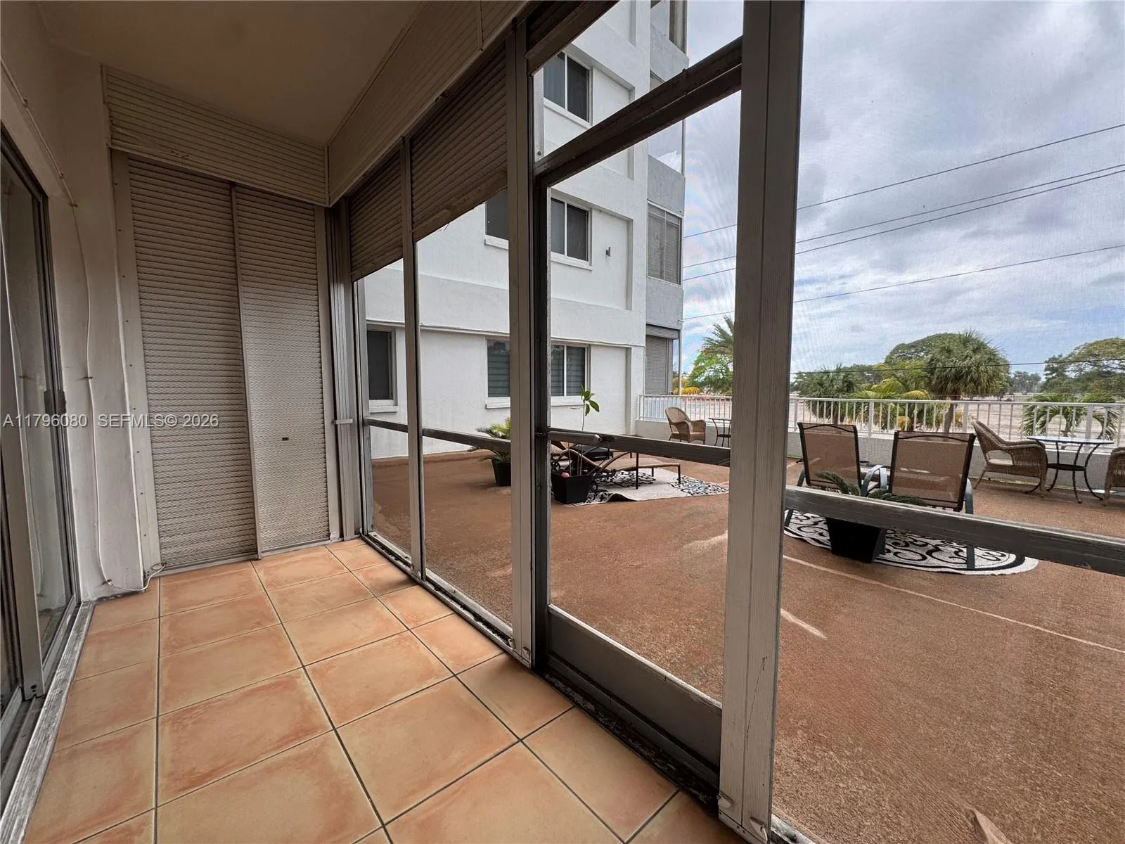 Private, screened patio with access to rarely-used common patio
