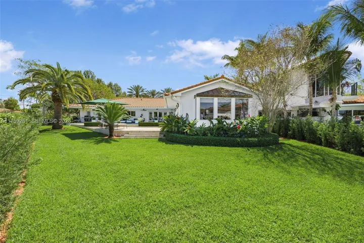 Waterfront manicured backyard