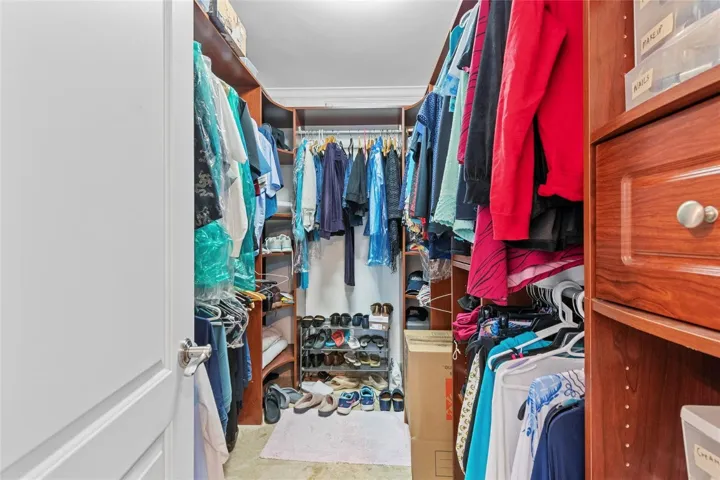 Walkin closet primary bedroom.