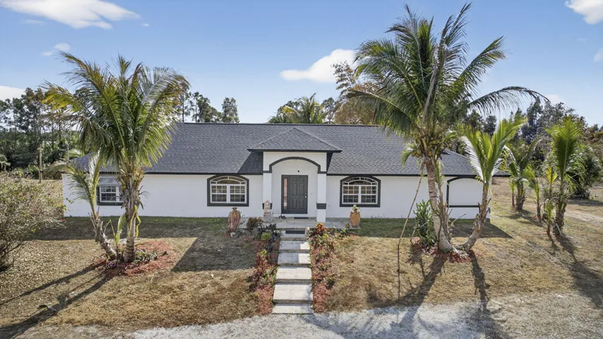 LOVELY 5 ACRE HOME WITH BRAND NEW ROOF!