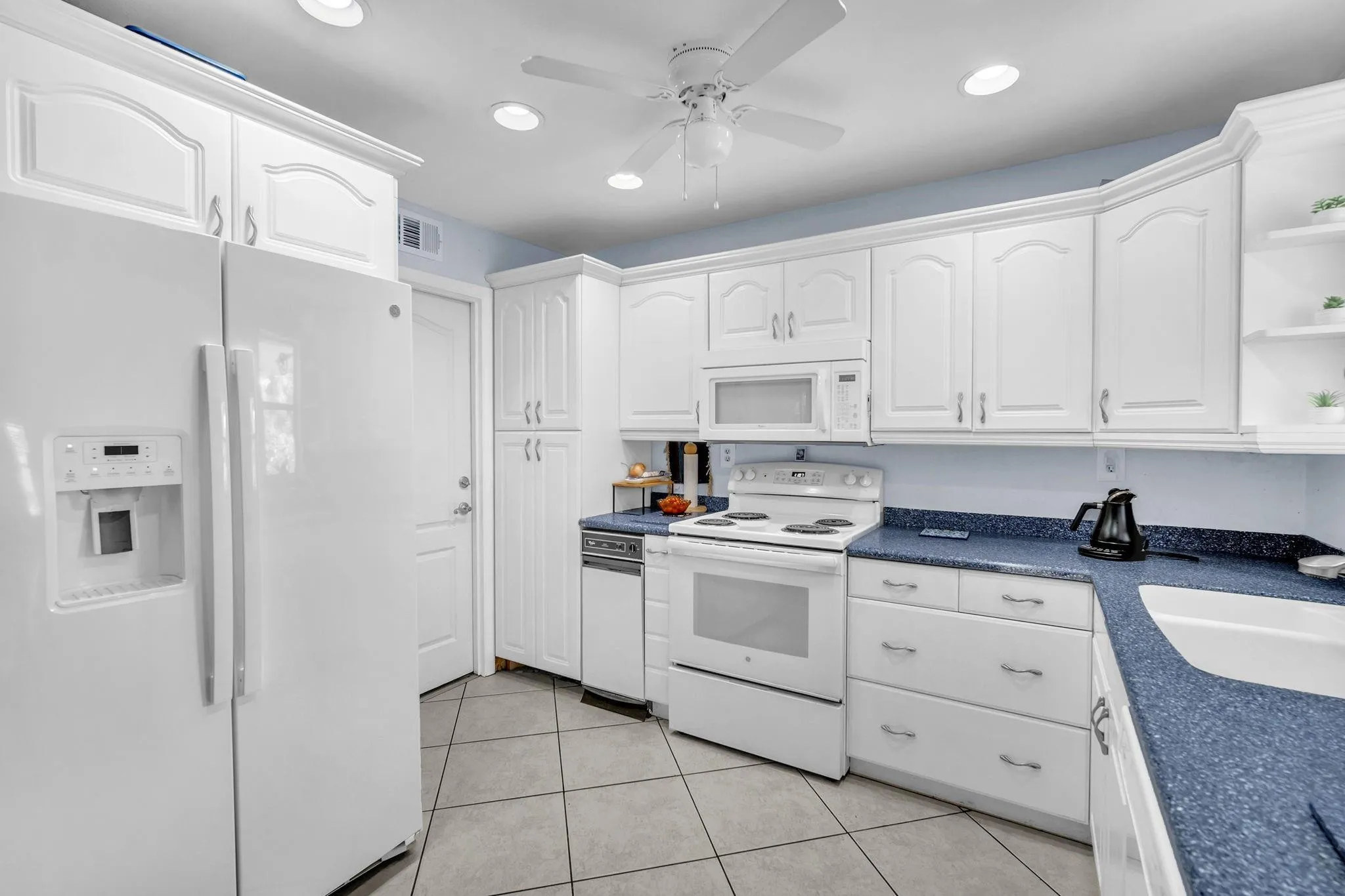 Kitchen. One car garage with laundry off the kitchen.