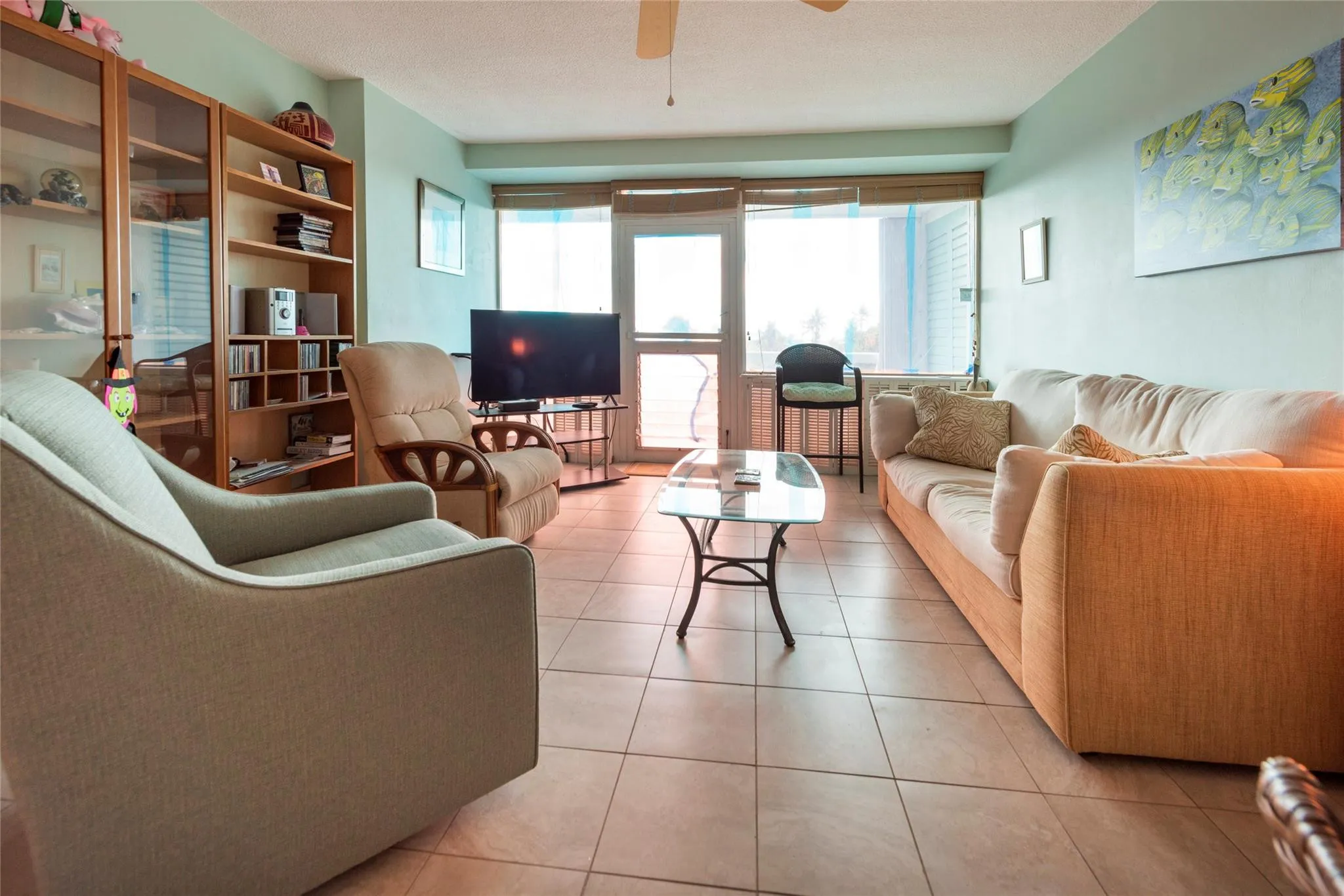 Living room opens to the spacious porch like balcony