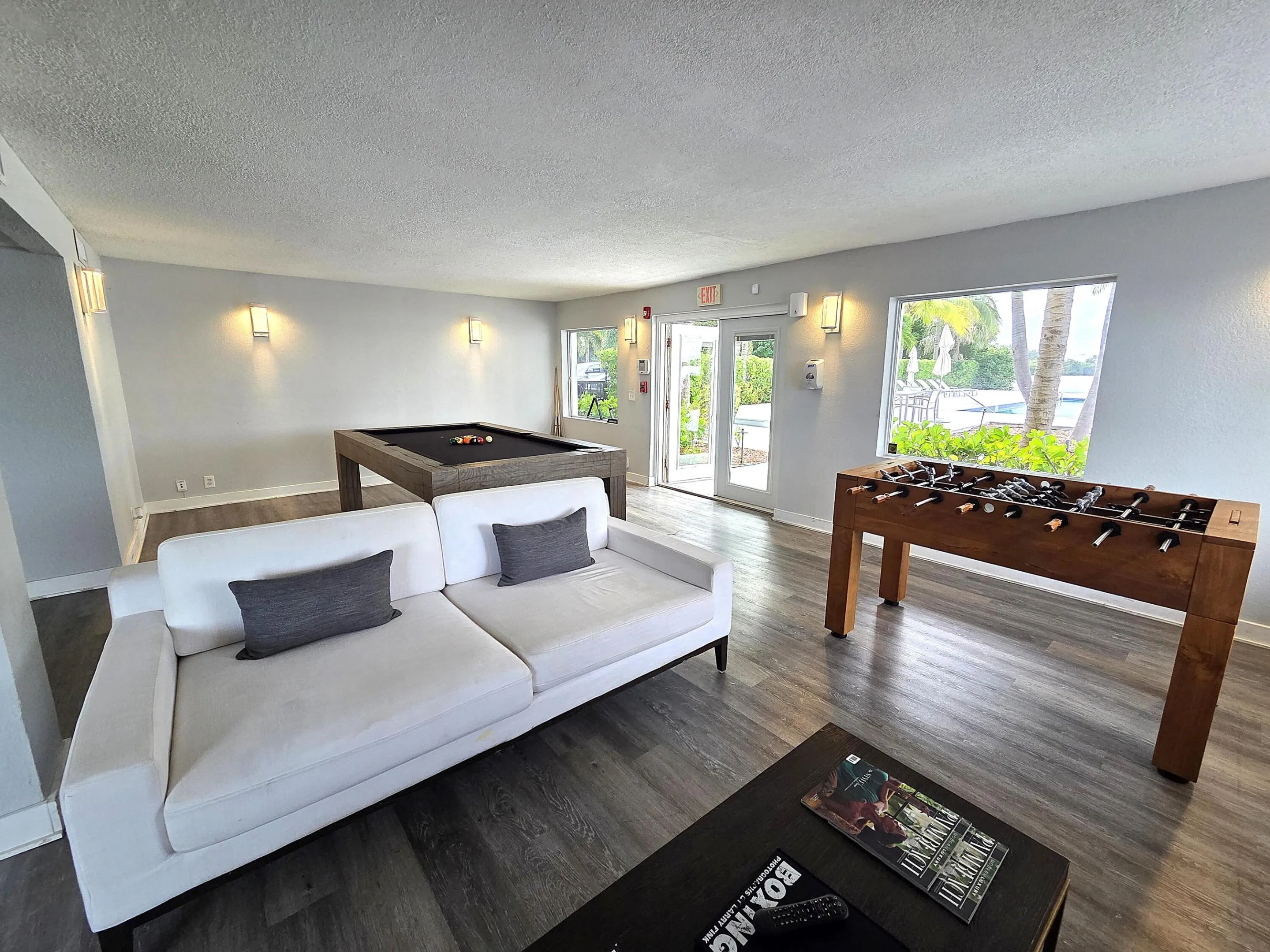 Day Room with Pool Table, Foosball, Couches and TV