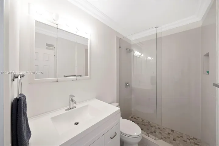 updated bathroom with GLASS SHOWER