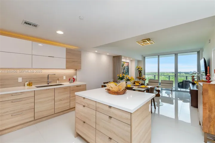 Kitchen - Many upgrades. very convenient: All shelves were converted to "soft close" drawers. Beautiful back-splash. Over and under cabinets lights were installed - compare with other units