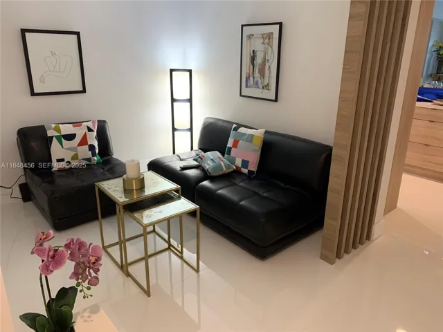 Den - It's in addition to the living room. Can be used as an office or a comfortable sitting area, to relax and watch TV