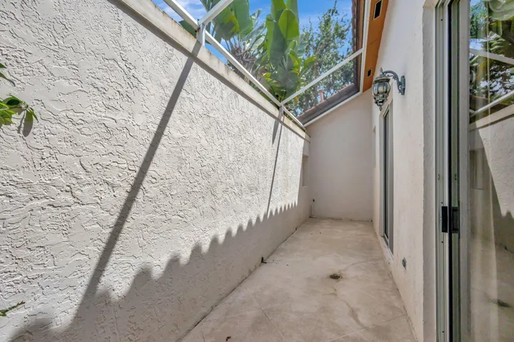 Screened side patio.