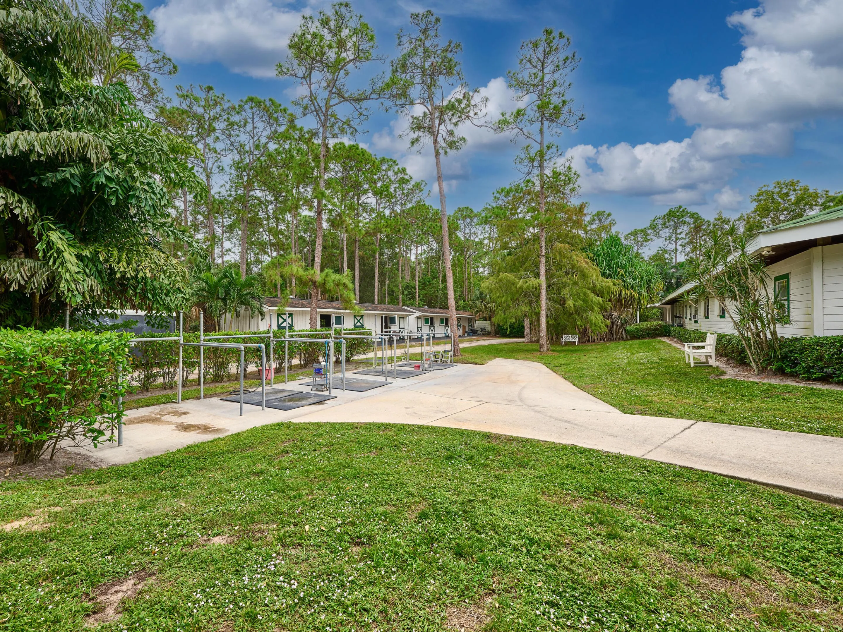 and the tour along the gated (at both exit points) path through the property. The cement path meanders through the property to deliver food, supplies and provide ample parking.