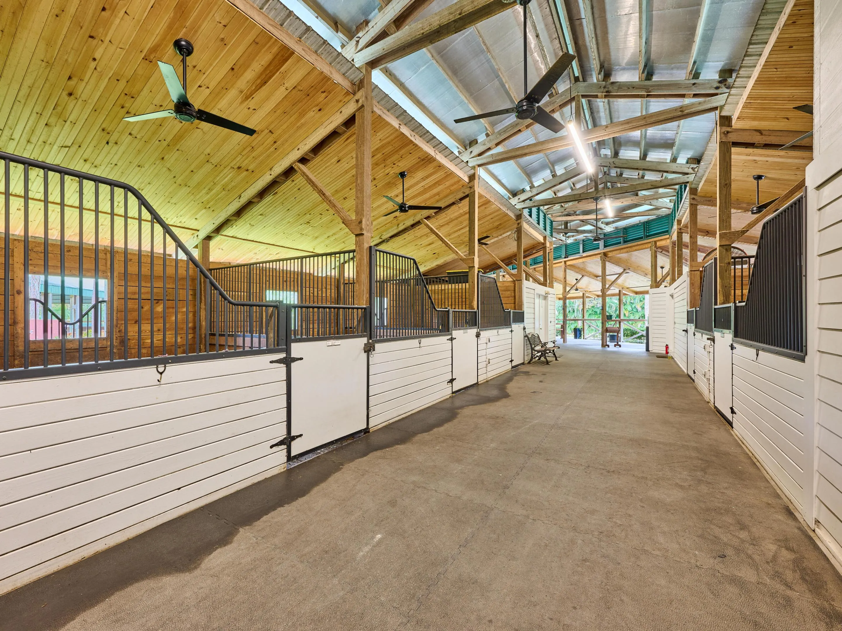 Center aisle view from rear of stable.