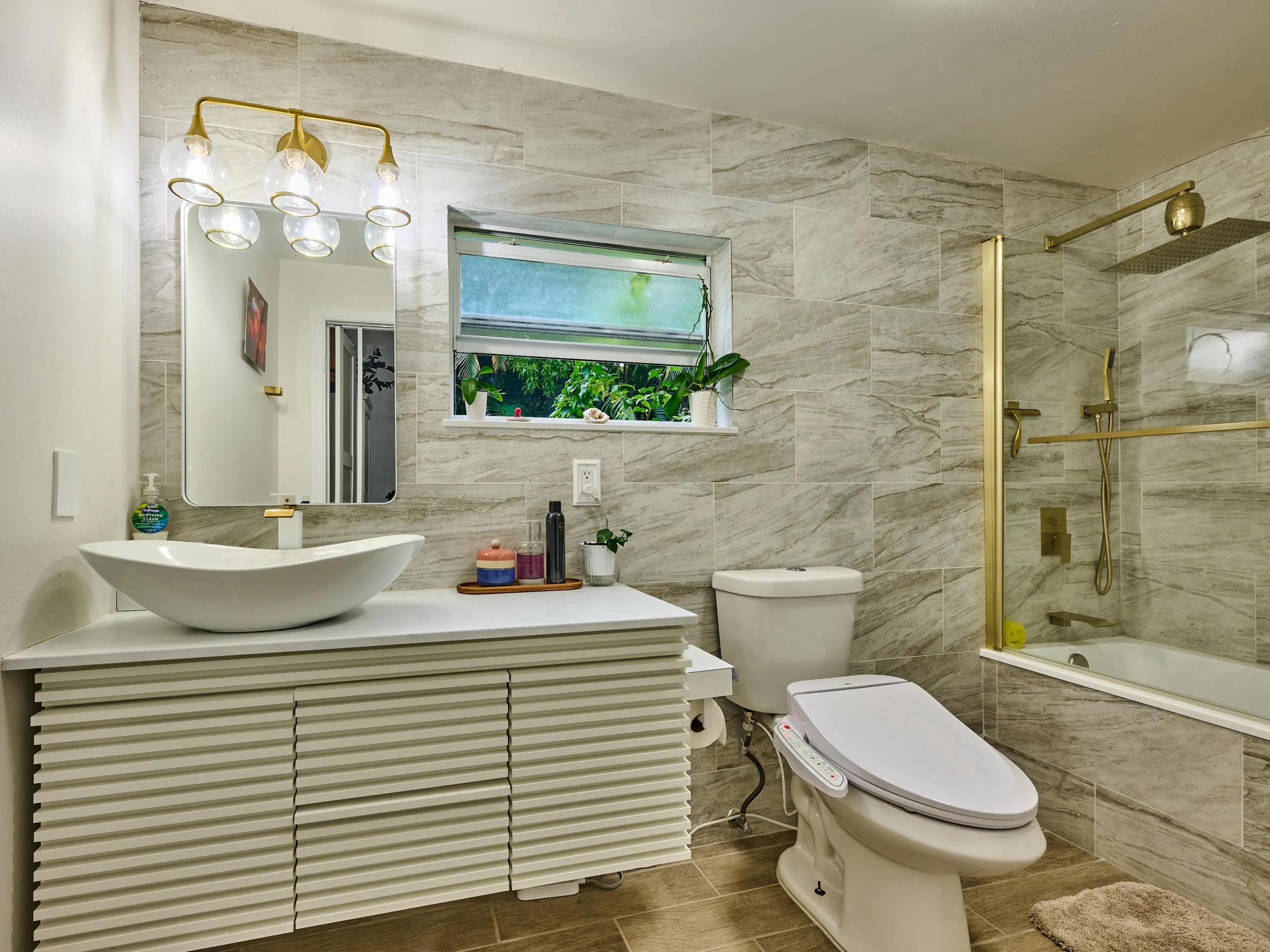 Contemporary bath is more than apartment sized and another great incentive to relax at the end of a long day on the farm.