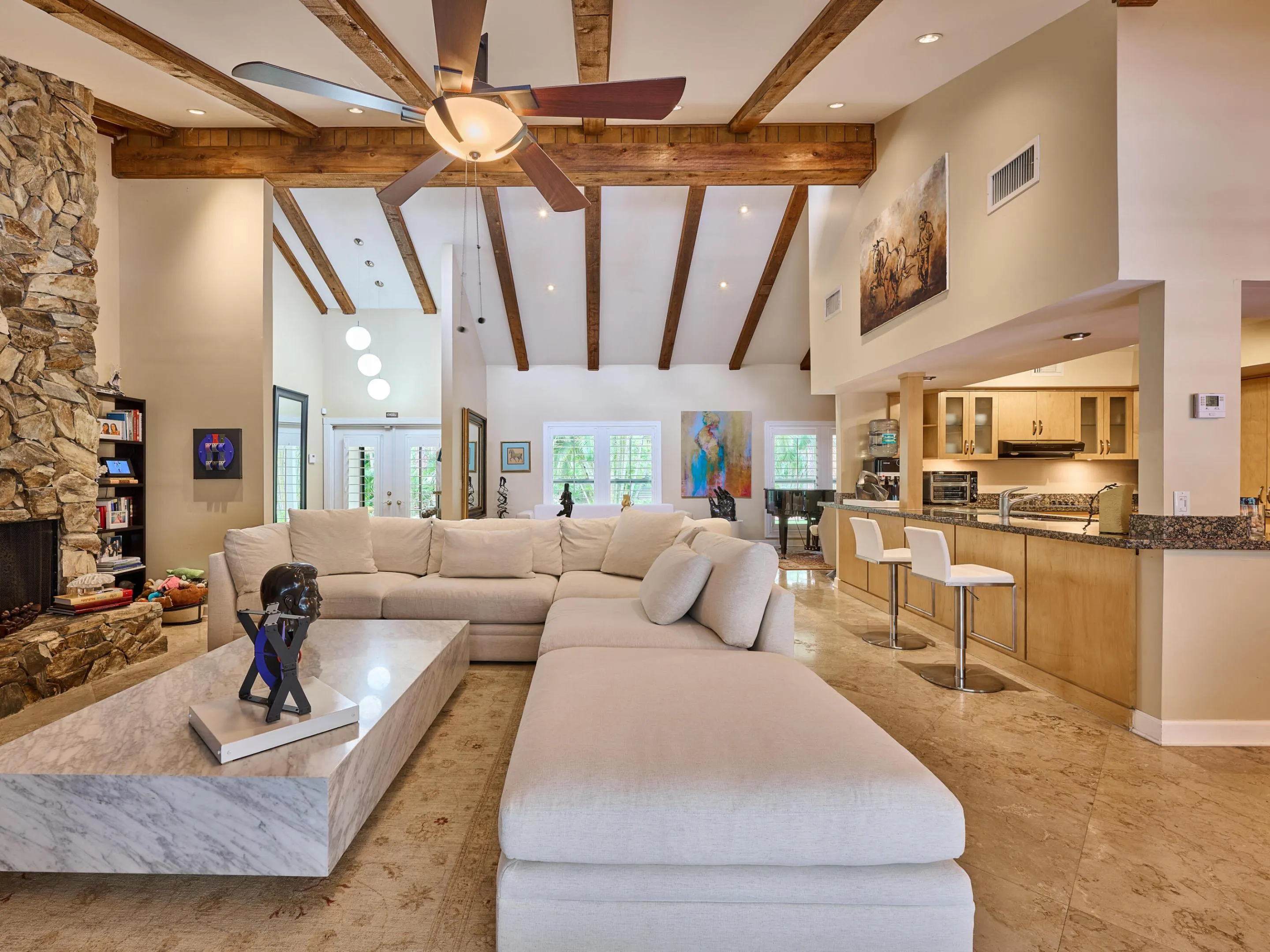 The beams are the perfect way to draw your eyes up and enlarge your perfectly sized home.