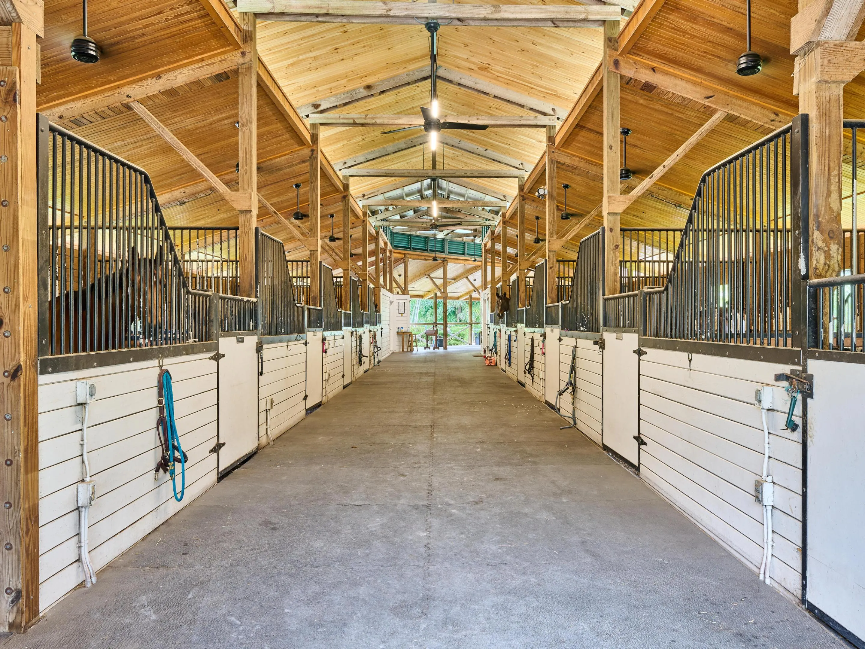 21-stall center-aisle barn at this Jupiter Farms equestrian estate.