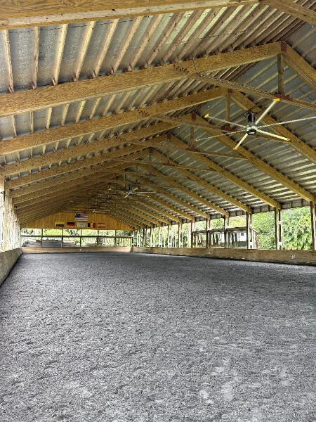 Added in 8/2025! HUGE Ceiling Fans to keep horses and riders cooler during training.