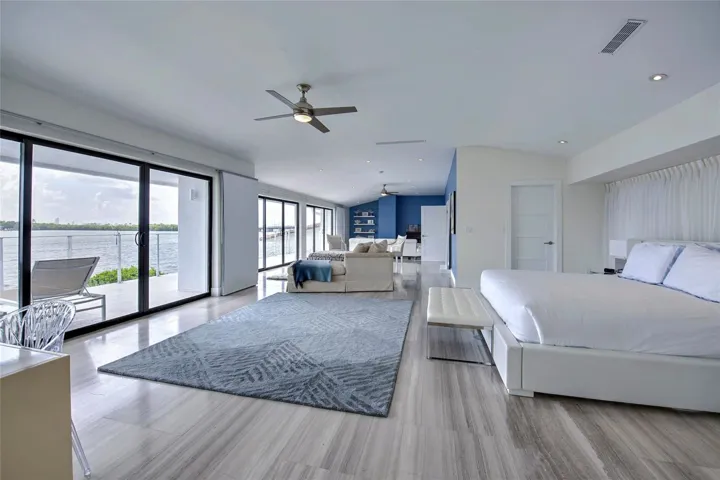 1240 SF Primary Suite with lounging area, 2 walk-in closets and full length balcony