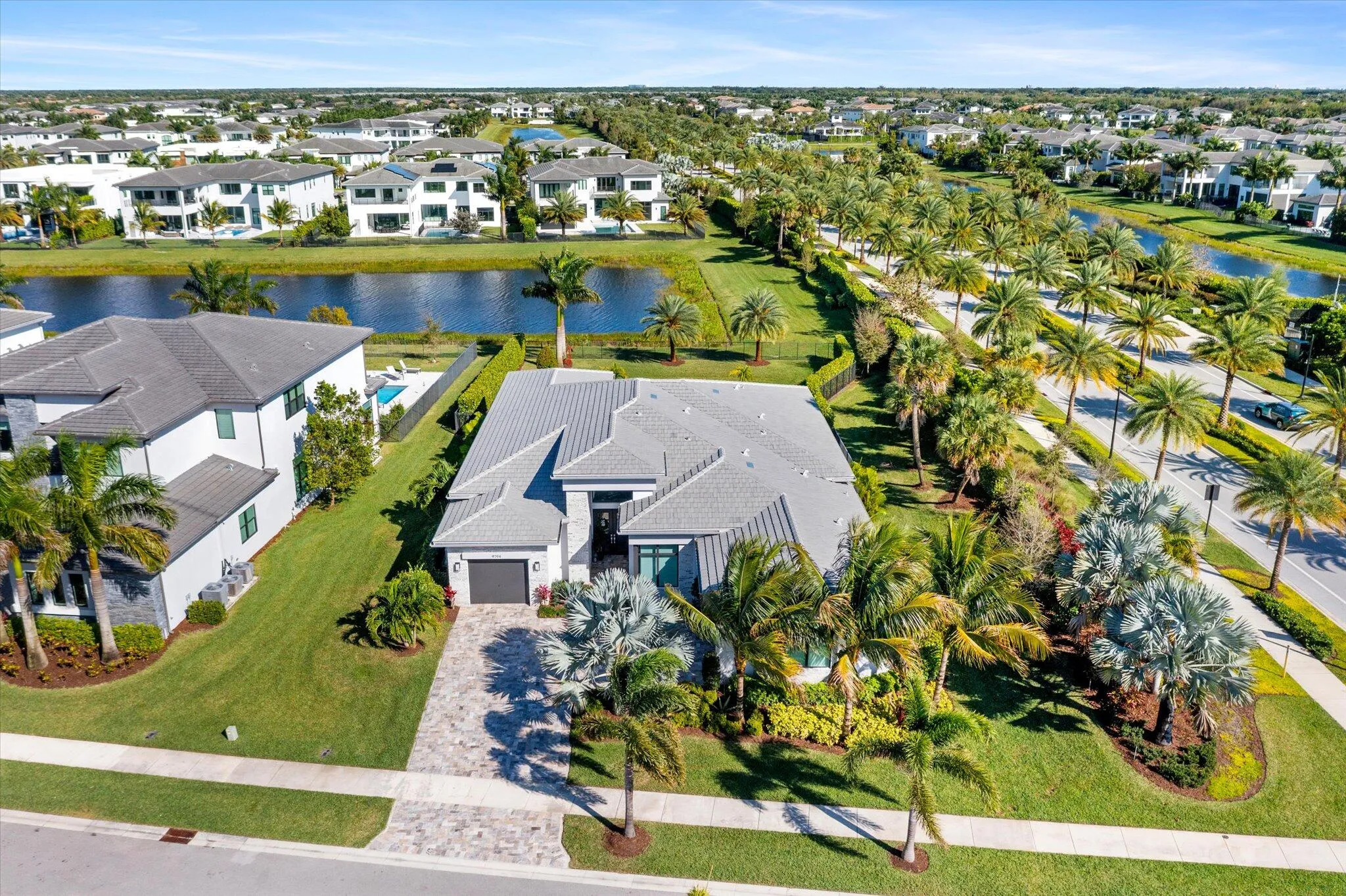 FRONT EXTERIOR - CORNER WATERFRONT LOT