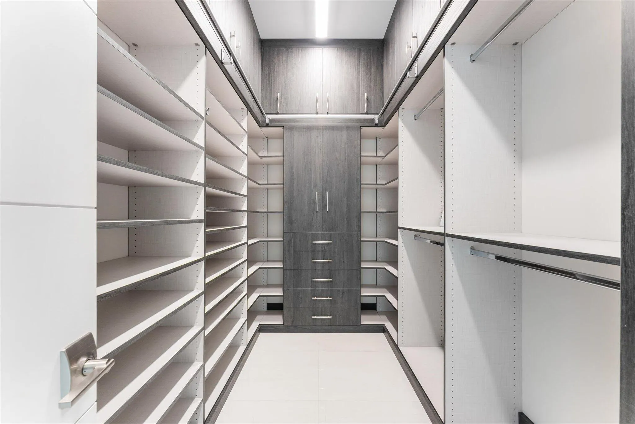 CUSTOM WALK-IN CLOSET #1 - PRIMARY SUITE - VACANT, MOVE-IN READY