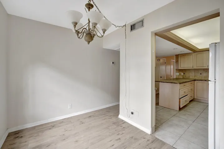 Formal Dining Area or space can be utilized as an Office/Den Area