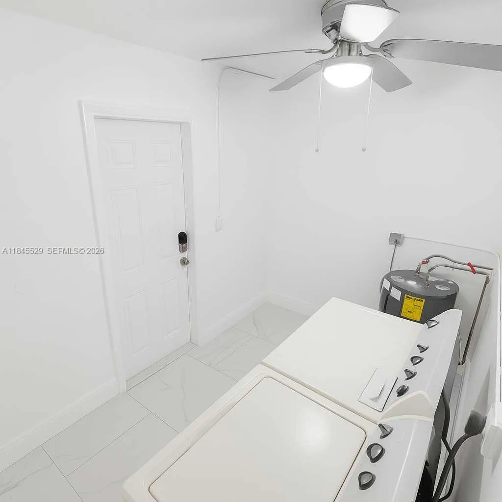 New water heater installed 3 years ago. Laundry room - Washer & dryer units included