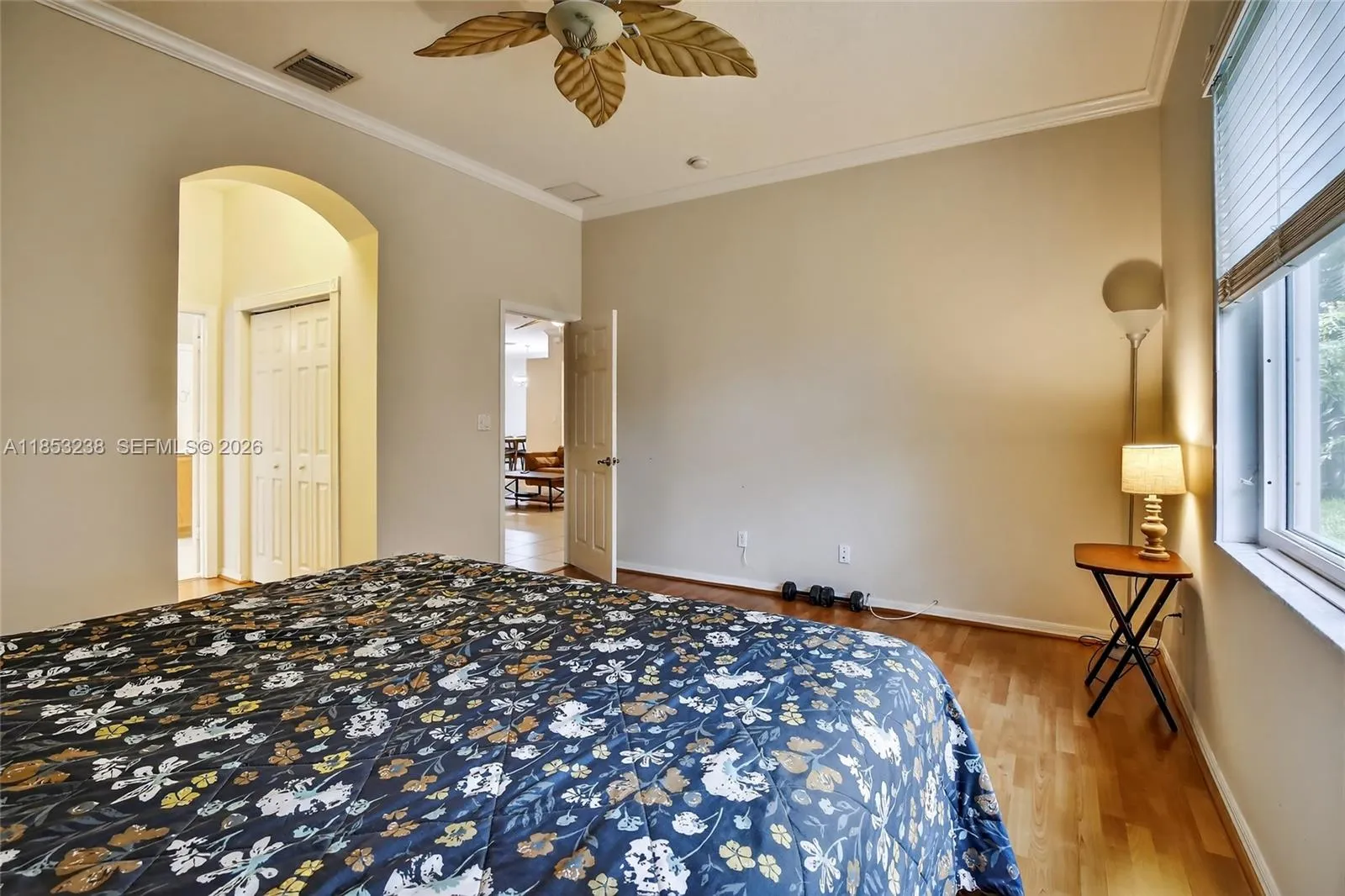 Spacious primary bedroom - hallway to his/her closets