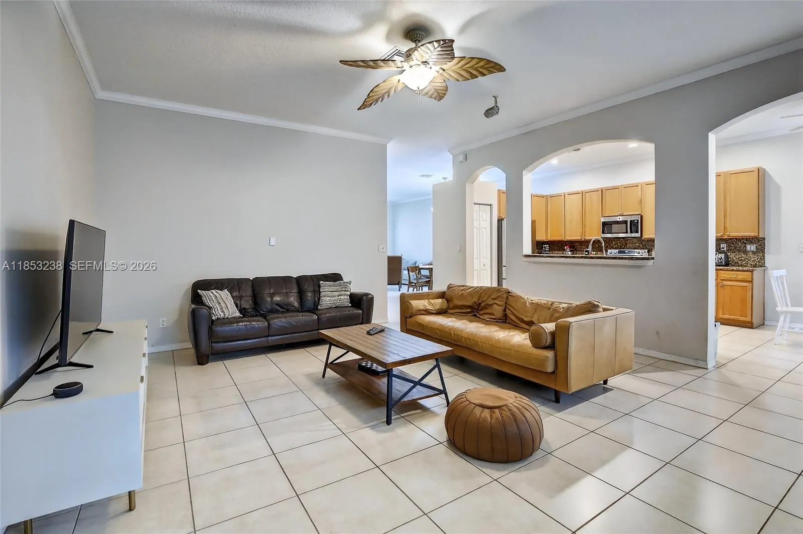 Spacious family room & open counter top area to kitchen