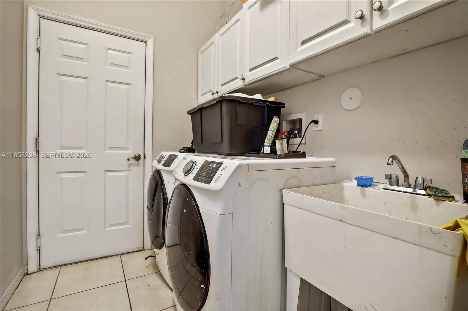 Laundry with access to garage